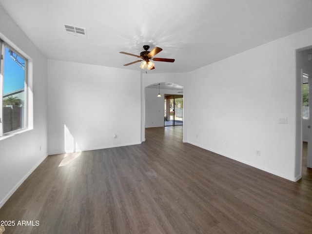 interior space featuring dark hardwood / wood-style floors and ceiling fan