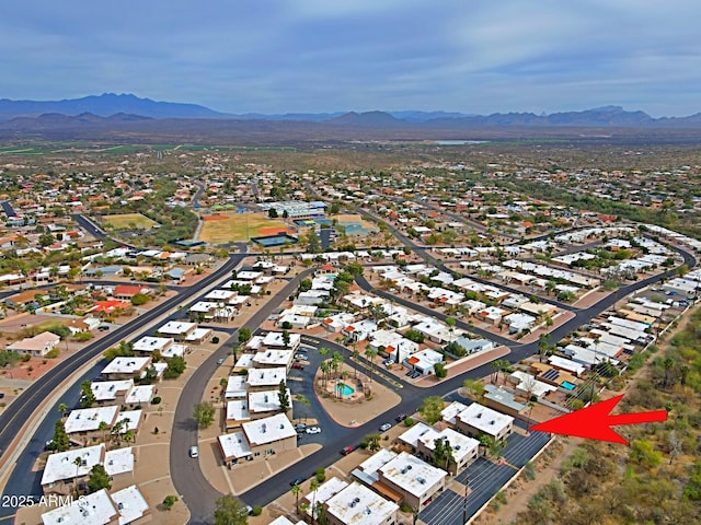 bird's eye view with a residential view and a mountain view