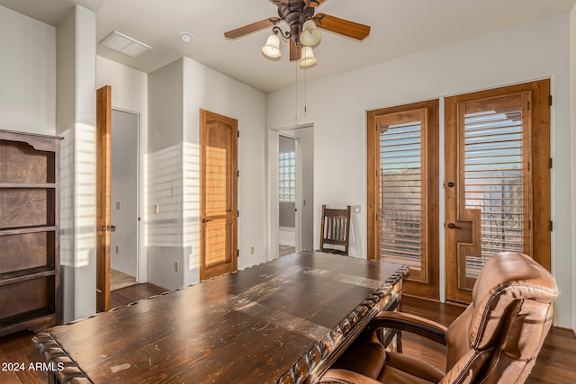 office featuring ceiling fan, a healthy amount of sunlight, and dark hardwood / wood-style flooring