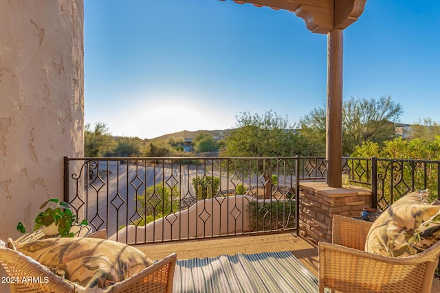 balcony featuring a mountain view