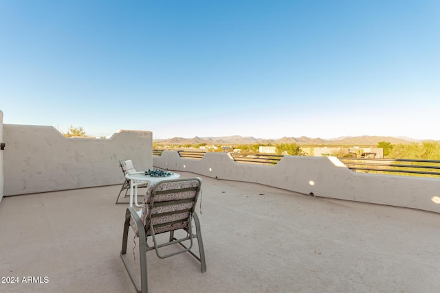 view of patio with a mountain view
