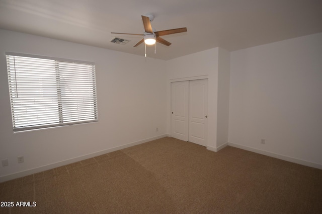 28377 N Desert Native St, San Tan Valley, AZ 85143 - unfurnished bedroom with light carpet, a closet, and ceiling fan