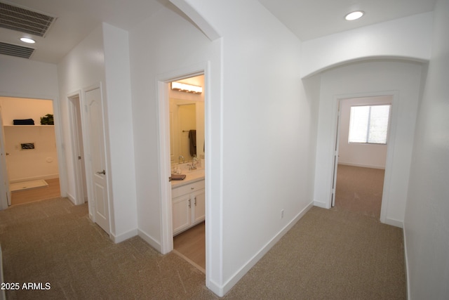 28377 N Desert Native St, San Tan Valley, AZ 85143 - hall featuring arched walkways and light colored carpet