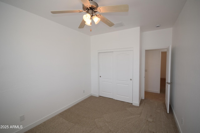 28377 N Desert Native St, San Tan Valley, AZ 85143 - unfurnished bedroom with carpet flooring, a closet, and ceiling fan