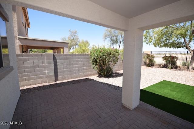 28377 N Desert Native St, San Tan Valley, AZ 85143 - fenced backyard with a patio area