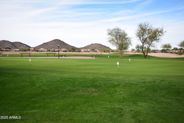 28377 N Desert Native St, San Tan Valley, AZ 85143 - view of home's community featuring a mountain view, an area to practice putting, and view of golf course