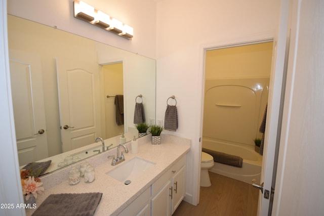 28377 N Desert Native St, San Tan Valley, AZ 85143 - bathroom featuring vanity, wood finished floors, and bathtub / shower combination