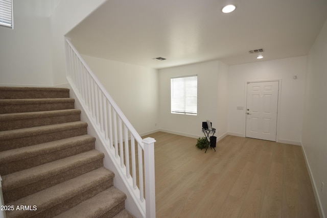 28377 N Desert Native St, San Tan Valley, AZ 85143 - entryway featuring stairs, light wood-style flooring, and recessed lighting