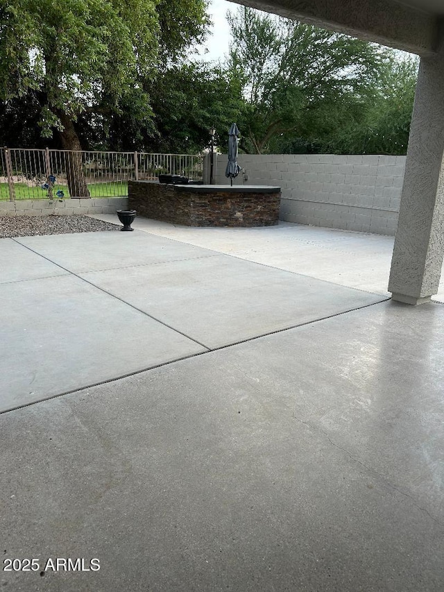 view of patio with fence