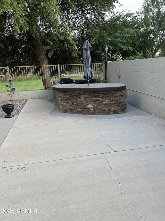 view of patio with fence