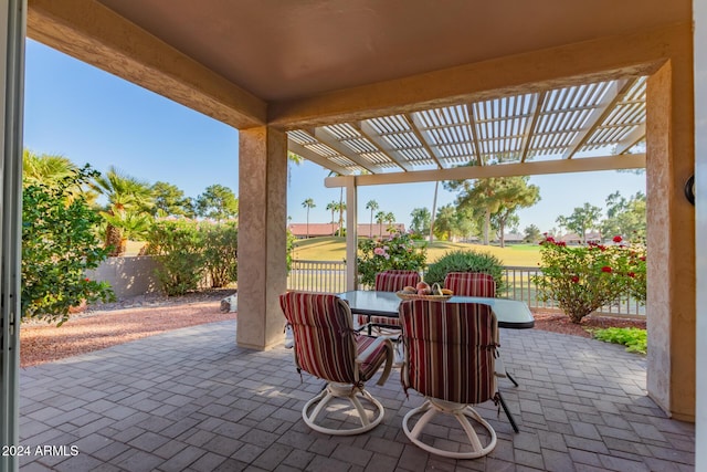 view of patio featuring a pergola