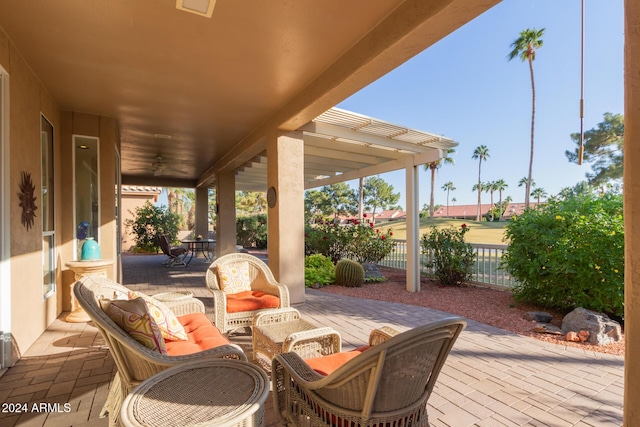 view of patio featuring outdoor lounge area and ceiling fan