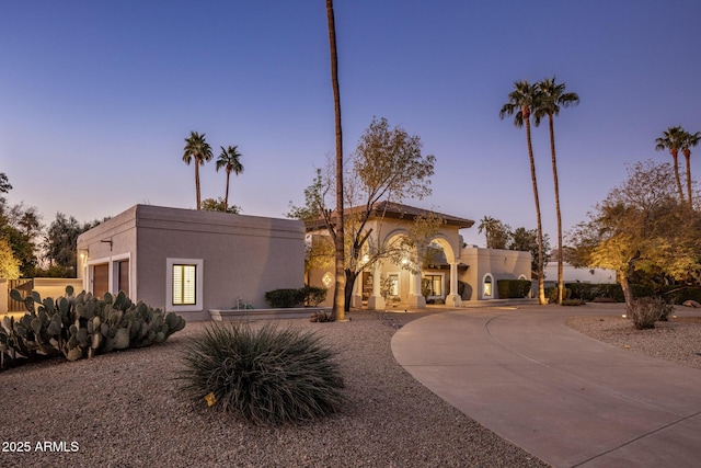 view of front of home with a garage