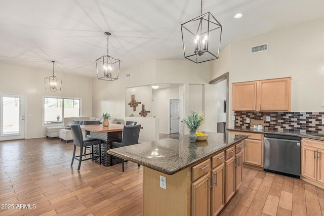 240 W Brooks St, Gilbert, AZ 85233 - kitchen with stainless steel dishwasher, tasteful backsplash, visible vents, a chandelier, and light wood finished floors