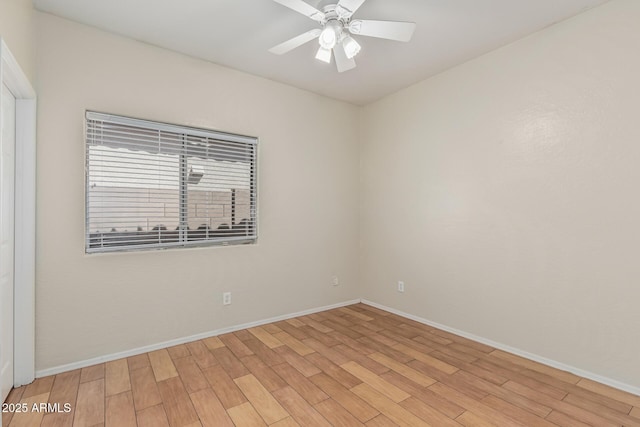 240 W Brooks St, Gilbert, AZ 85233 - spare room featuring baseboards, light wood-type flooring, and a ceiling fan