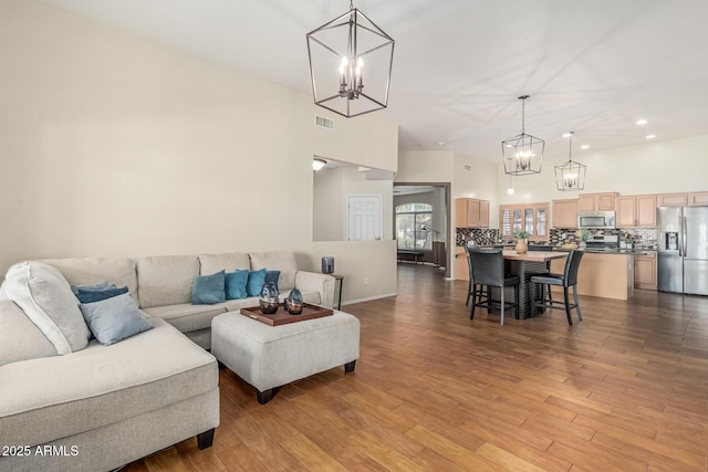 240 W Brooks St, Gilbert, AZ 85233 - living room featuring visible vents, recessed lighting, a chandelier, and wood finished floors