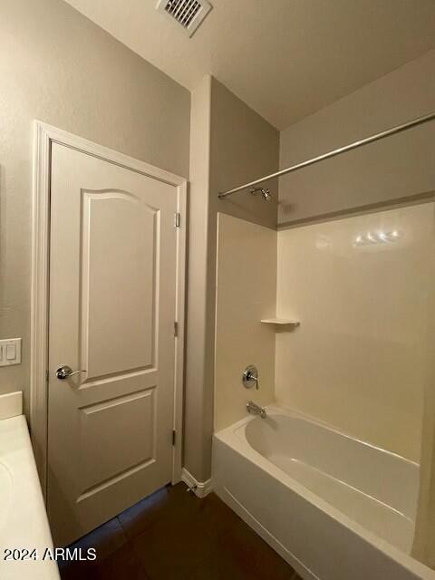 bathroom with tile patterned floors, vanity, and bathtub / shower combination