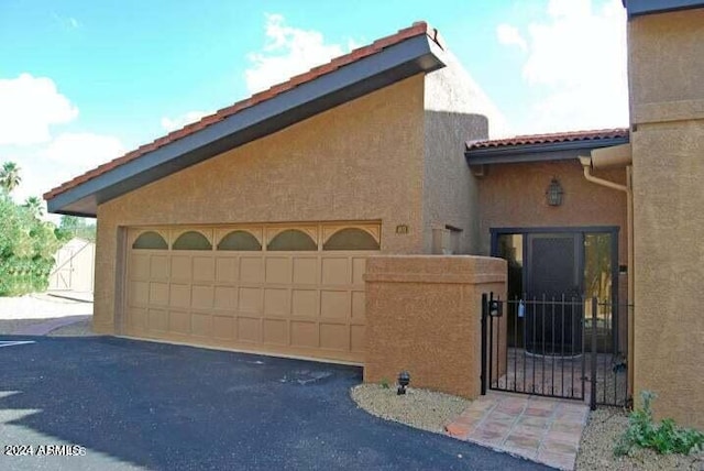 view of front of home featuring a garage