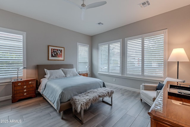 bedroom featuring ceiling fan and light hardwood / wood-style floors