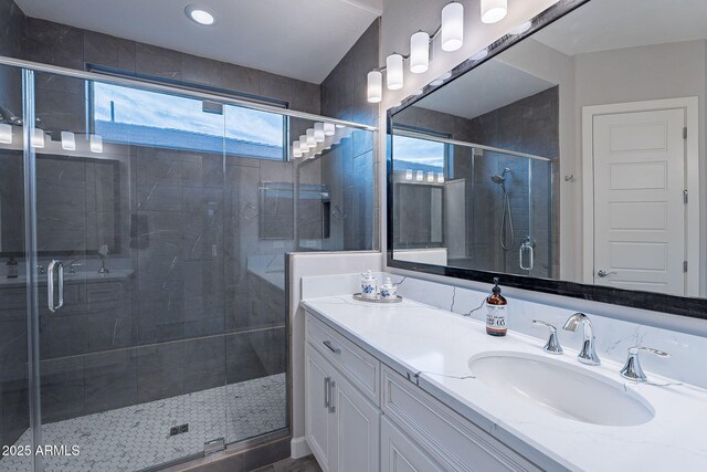 bathroom with vanity and an enclosed shower