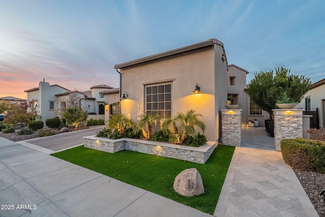 view of front of property featuring an outdoor kitchen