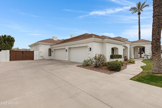 mediterranean / spanish-style home featuring a garage