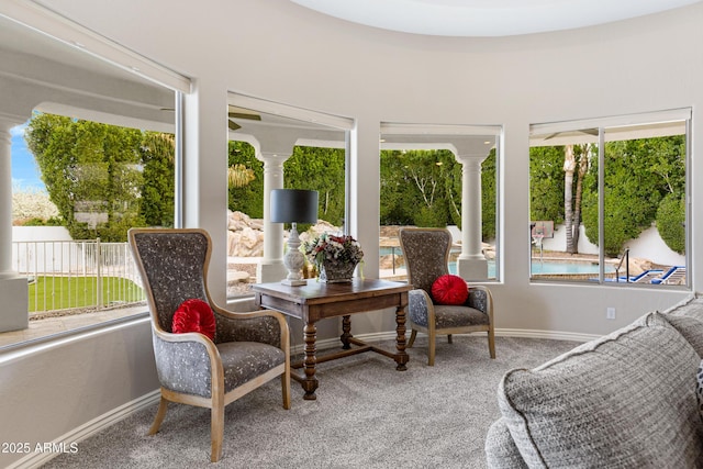 sunroom / solarium with ornate columns