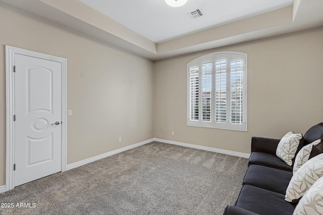 unfurnished living room featuring carpet flooring