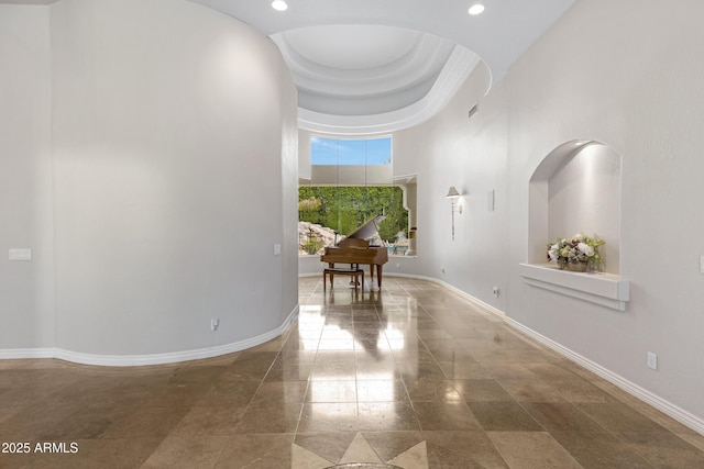 hallway with a high ceiling