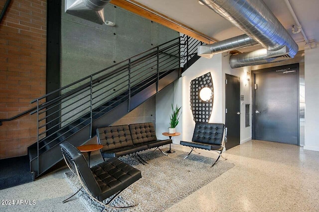 common area with stairs
