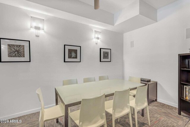 dining room featuring baseboards and visible vents