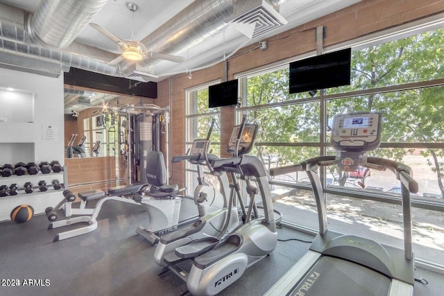 workout area with visible vents and a ceiling fan