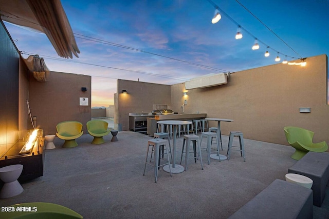 view of patio with outdoor dry bar