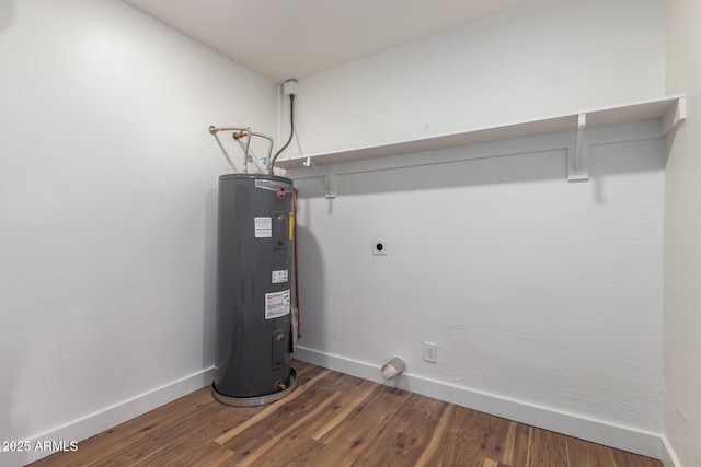 utility room featuring electric water heater