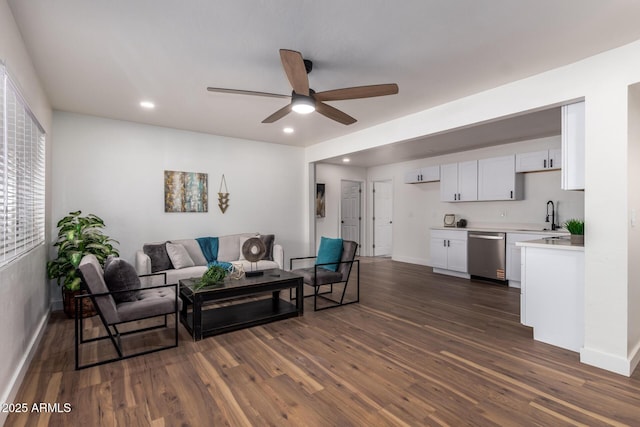 living room featuring recessed lighting, baseboards, ceiling fan, and dark wood-style flooring