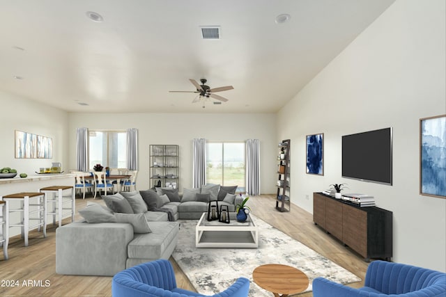 living room featuring ceiling fan and light wood-type flooring