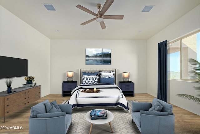 bedroom with hardwood / wood-style floors and ceiling fan