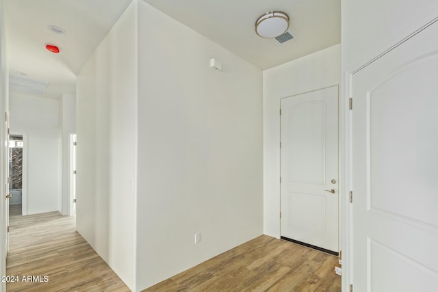 hall featuring light hardwood / wood-style flooring