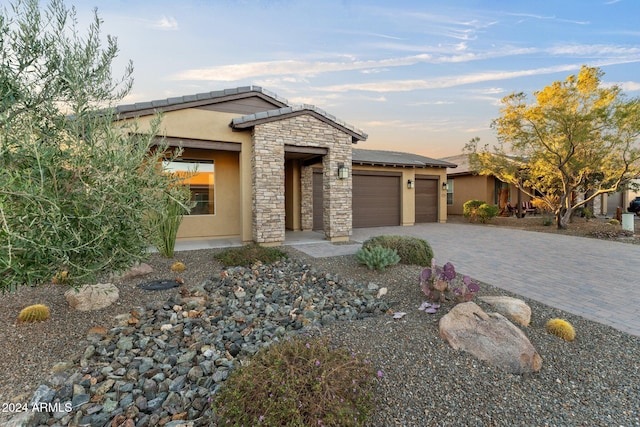 prairie-style home with a garage