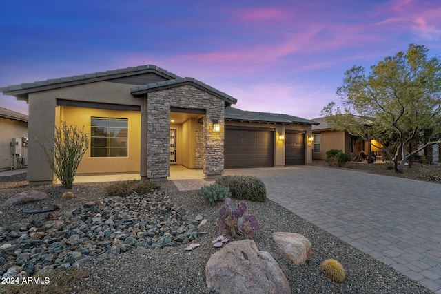 view of front of property featuring a garage