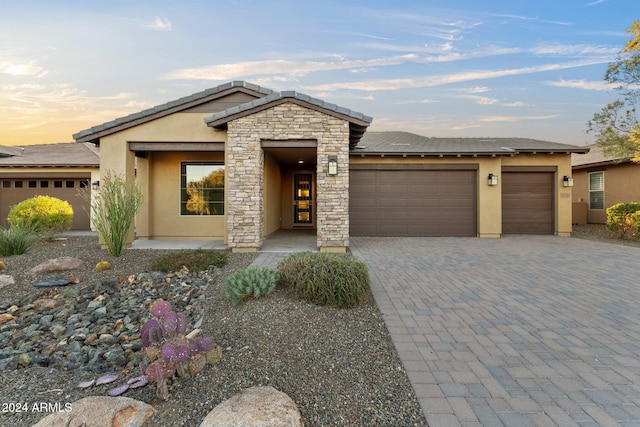 prairie-style house with a garage