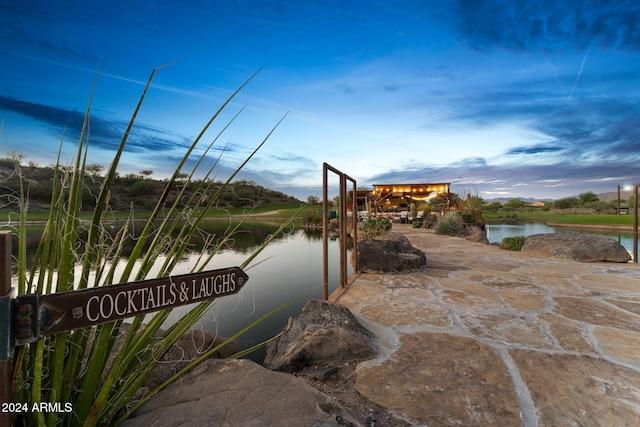 exterior space with a water view