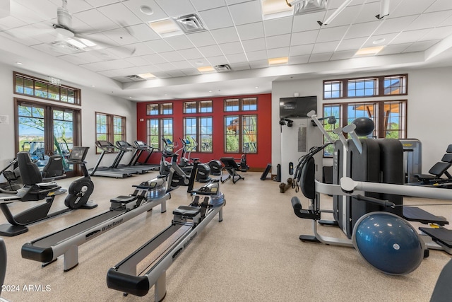 exercise room with french doors and a drop ceiling