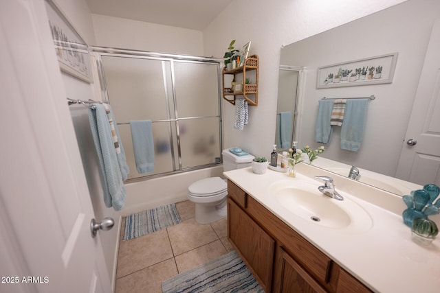 16021 N 30th St Unit 127, Phoenix, AZ 85032 - bathroom featuring vanity, toilet, shower / bath combination with glass door, and tile patterned floors