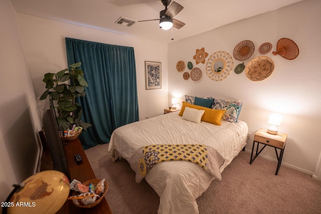 16021 N 30th St Unit 127, Phoenix, AZ 85032 - bedroom with carpet, baseboards, and a ceiling fan