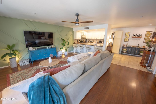 16021 N 30th St Unit 127, Phoenix, AZ 85032 - living room with ceiling fan and wood finished floors
