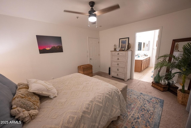 16021 N 30th St Unit 127, Phoenix, AZ 85032 - bedroom with light carpet, a ceiling fan, and connected bathroom