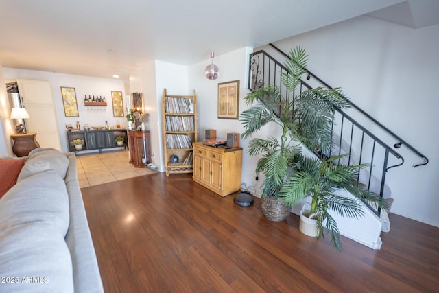 16021 N 30th St Unit 127, Phoenix, AZ 85032 - living room with stairway and wood finished floors