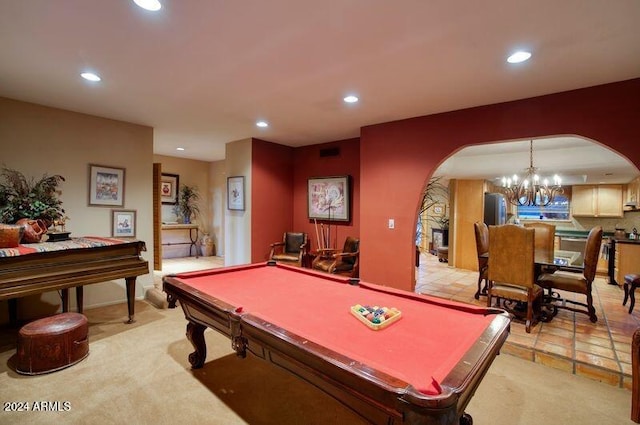 game room featuring pool table, light colored carpet, and a notable chandelier