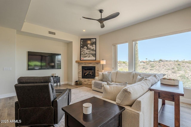 16248 E Ridgeline Dr, Fountain Hills, AZ 85268 - living area with baseboards, a ceiling fan, wood finished floors, and visible vents